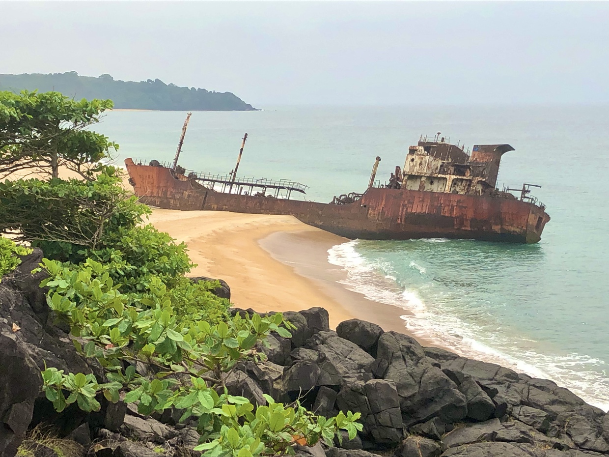 A boat on the shore of Robertsport beach