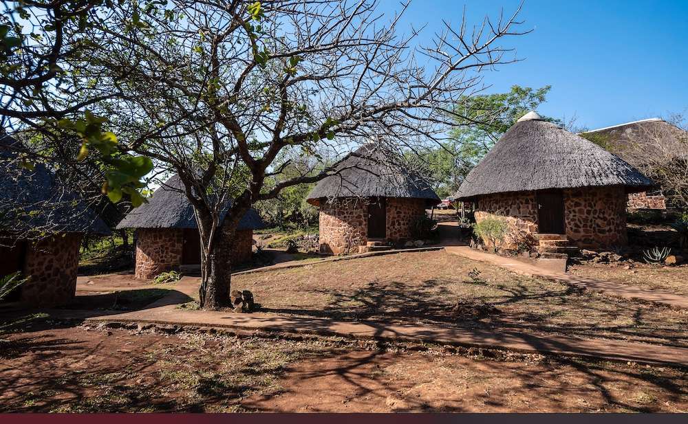 Brick and straw huts in a village in Eswatini