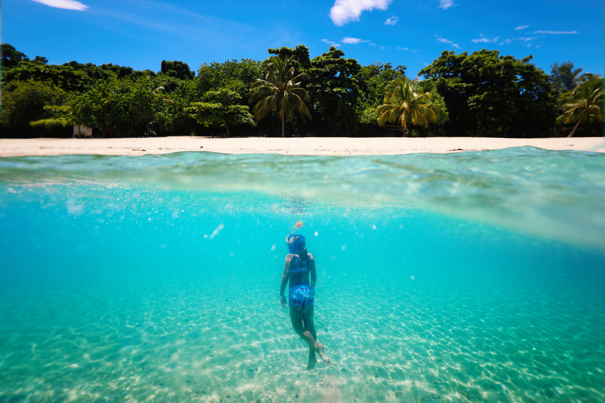 Snorkeler underwater off the shore of a beautiful Madagascar beach  