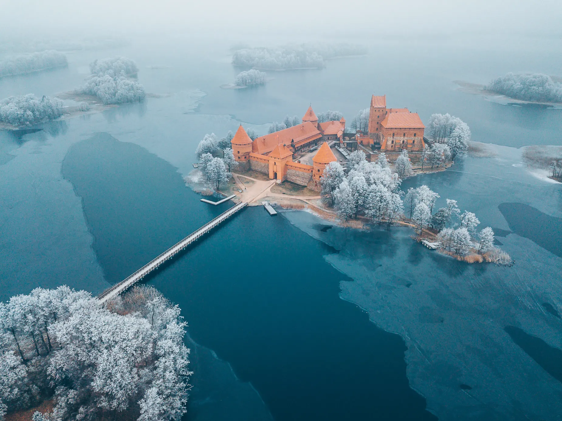 A castle in the center of a frozen lake
