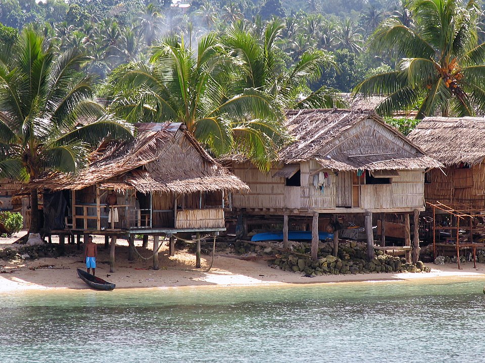 straw huts on the beach in Solomon Islands
